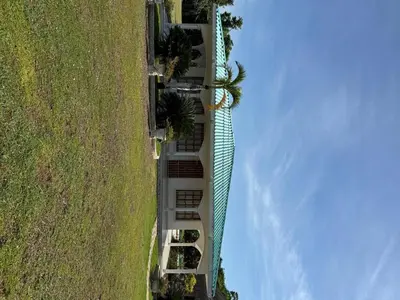 an overhead view of a building next to a field at Cabaña la fortuna in Turbaco