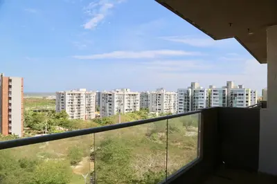 a balcony with a view of a city at Apartamento en Riomar in Barranquilla