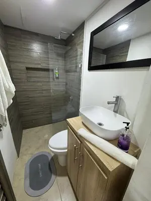 a bathroom with a sink and a toilet and a shower at Conjunto Residencial Caribe Campestre in Coveñas