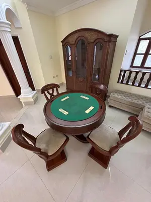 a poker table and chairs in a room at Casa Rey Colonial 1910 Manga - 7 Habitaciones in Cartagena de Indias