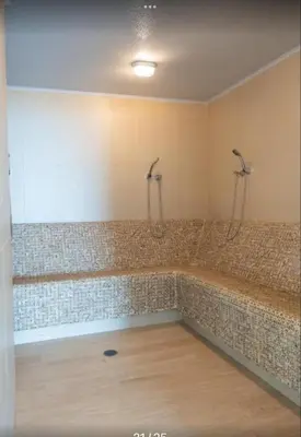 a bathroom with a large tub with two shower at Relax vista al mar Aparta suite in Cartagena de Indias