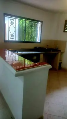 a kitchen with a sink and a window at Cabaña Turística a Pasos del Mar, Ideal para Grupo in San Antero