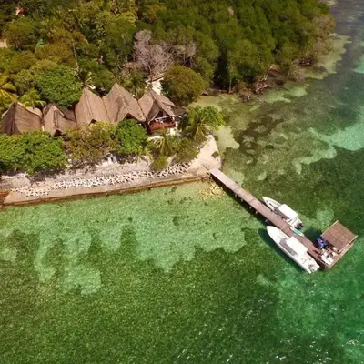 Accommodation on a coral island with turquoise sea