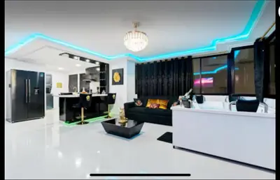 a living room with a couch and a table at Modern Luxury 2BR with Private Jacuzzi in Cartagena de Indias