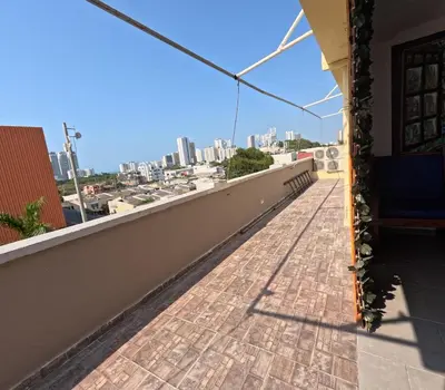 a balcony with a view of the city at Cartagena loft apartment near historic center in Cartagena de Indias