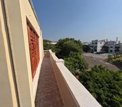 a balcony of a building with a brick wall at Cartagena loft apartment near historic center in Cartagena de Indias