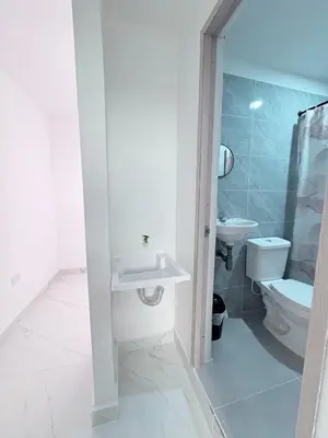 a bathroom with a sink and a toilet at Maru apartamentos #5 in Cartagena de Indias