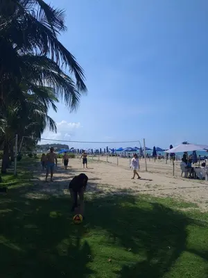 a person playing with a ball on the beach at A pasos de playa privada Serena del Mar Cartagena in Cartagena de Indias