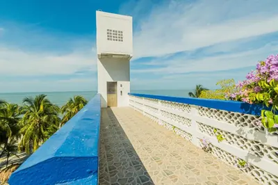a view of the ocean from the balcony of a lighthouse at Paraíso By Elemnt Rentals in Santa Marta