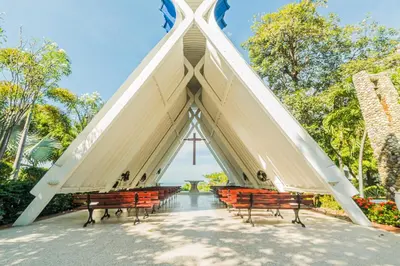 a group of benches with a pyramid shaped structure at Paraíso By Elemnt Rentals in Santa Marta
