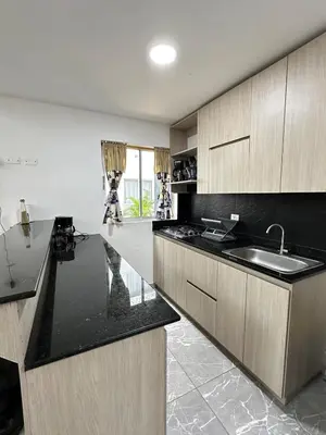 a kitchen with a sink and a counter top at Casa2 Duplex AC WiFi Piscina Acceso al mar in San Bernardo del Viento