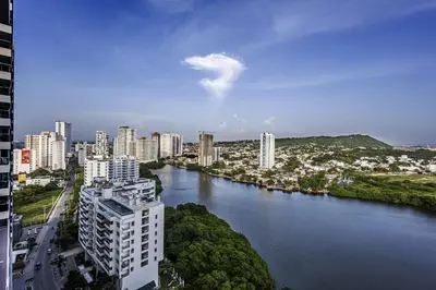 a view of a city with a river and buildings at NEW Apartment, best rooftop pool view, Cartagena - Visitors NOT ALLOWED in Cartagena de Indias