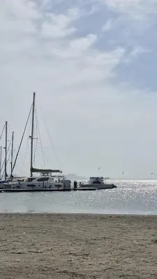 a boat is docked at a dock in the water at Apto puerto velero in Barranquilla
