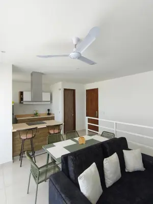 a living room with a couch and a table at Apto 411 puerto velero in Tubará