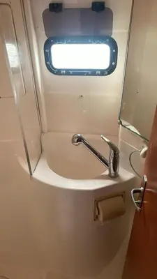 a bathroom with a sink and a faucet at Catamaran in Cartagena Bay in Cartagena de Indias