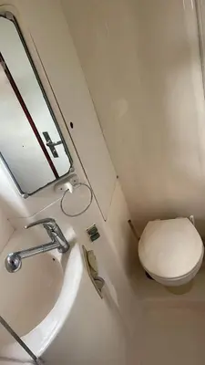 a bathroom with a toilet and a sink at Catamaran in Cartagena Bay in Cartagena de Indias