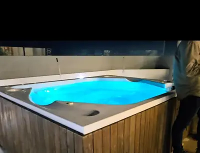 a jacuzzi tub with blue water in it at Brand New, Perfectly Located 2-2 in CieloMar! in Cartagena de Indias