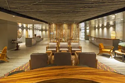 a conference room with a table and chairs in a building at Movich Buró 51 in Barranquilla