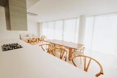 a room with a table and chairs and a couch at Morros EOS Manzanillo del mar in Cartagena de Indias