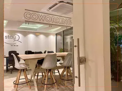 a conference room with a table and chairs at Tu refugio en la playa, moderno cómodo con estilo in Cartagena de Indias