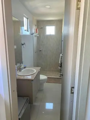 a bathroom with a sink and a toilet at Apartamento en Riomar a pocas cuadras CC Buenavista in Barranquilla