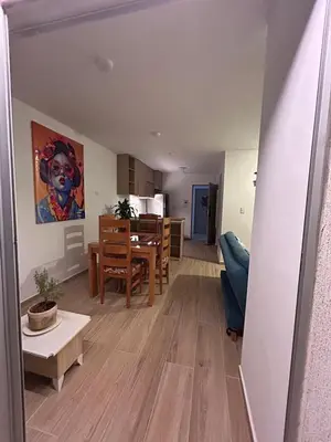a living room with a couch and a table at New apartment 5 minutes from the beach in Cartagena de Indias