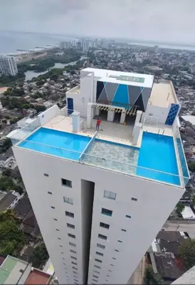 a building with a swimming pool on top of it at New apartment 5 minutes from the beach in Cartagena de Indias