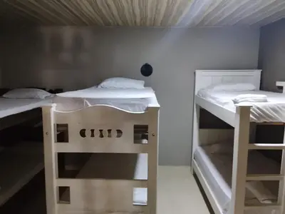 two bunk beds in a small room at Hotel Pesquera rincon berrugas in Berrugas