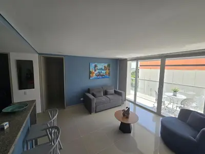 a living room with a couch and a table at OceanDrive509 in Cartagena de Indias