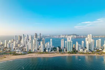 an aerial view of a city and the ocean at 10BR Mansion Beachfront w Pool and Disco in Cartagena de Indias