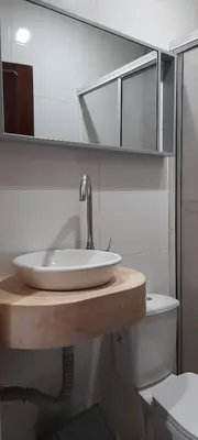 a bathroom with a sink and a toilet at Habitación Luminosa Manga in Cartagena de Indias