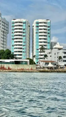 a body of water with tall buildings in the background at Vive al estilo Cartagenero frente al mar y al lago in Cartagena de Indias