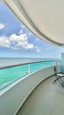 a balcony with a view of the ocean at Vive Cartagena frente al mar y el lago in Cartagena de Indias