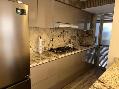 a kitchen with a stove and a counter top at Luxury apartment in Barranquilla