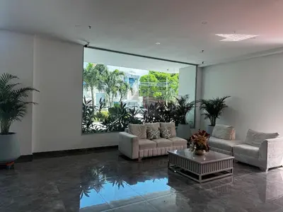 a living room with two couches and a table at NEW Premium 1BR Apartment in the Best Area in Barranquilla