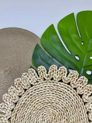 a straw hat with a bunch of leaves on it at Caribbean Deluxe Apartment Walk to Beach WiFi in Cartagena de Indias