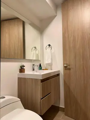 a bathroom with a toilet and a sink at refugio moderno in Barranquilla