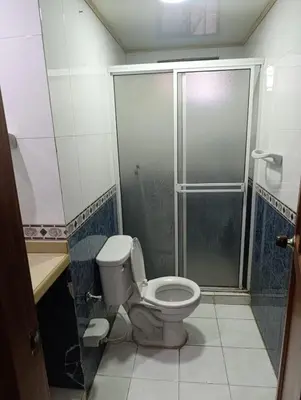 a bathroom with a toilet and a shower at Salomón el rey in Barranquilla