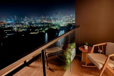 a room with a view of a city at night at Now booking April! Walking to City Center 2 BDRM in Cartagena de Indias
