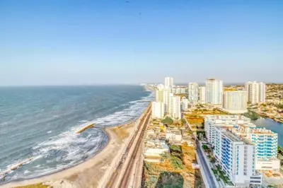 an aerial view of a city and the ocean at BEACH FRONT Condo walking to centro and beach 2BD in Cartagena de Indias