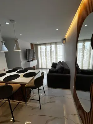 a living room with a table and a couch at Apt 2704 in Cartagena de Indias