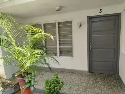 a door of a house with plants in front of it at Cartagena, full house in Cartagena de Indias