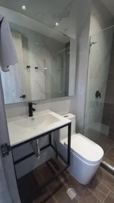 a bathroom with a sink and a toilet and a shower at Habitación Edificio Shanty 203 in Barranquilla