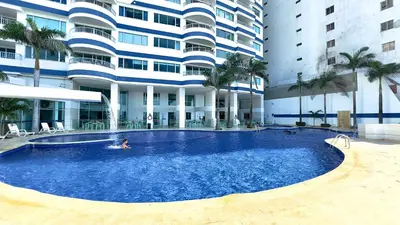 a large swimming pool in front of a building at Bocagrande Summer Beach - Primera linea de mar in Cartagena de Indias