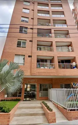 a brick building with a staircase in front of it at Confort y Estilo en el Norte de Barranquilla in Barranquilla