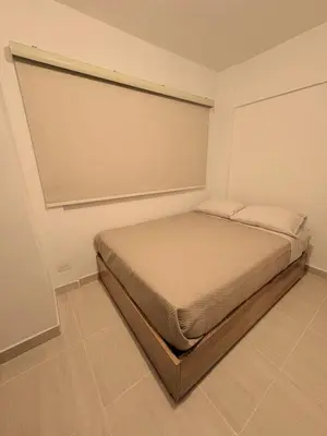 a bedroom with a bed in a room at Charming Apartment Close to the Beach in Cartagena de Indias