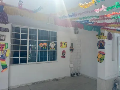 a room with a white wall with a window at The best room in Barranquilla! in Barranquilla