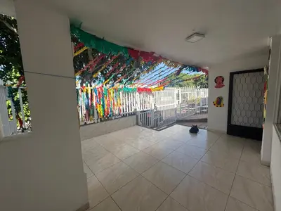 a hallway with a wall with colorful streamers at The best room in Barranquilla! in Barranquilla