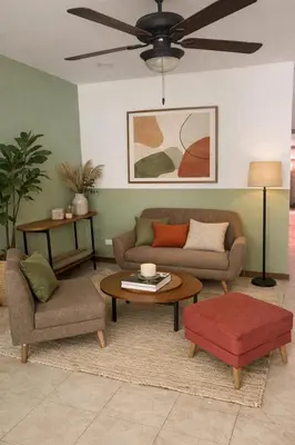 a living room with a couch and a table at Casa Guayabal hostal& cocina in Cartagena de Indias