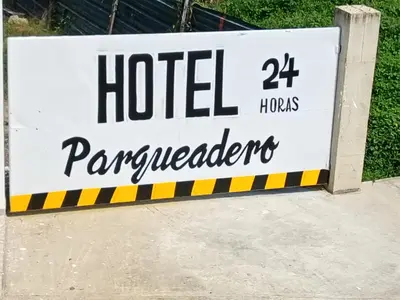 a sign for a pagogues at Hotel Porton De La Sabana in San Onofre